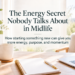 Bright, feminine workspace with a laptop, notebook, coffee mug, and flowers, featuring the title “The Energy Secret Nobody Talks About in Midlife” and a subtitle about finding more energy through starting something new.